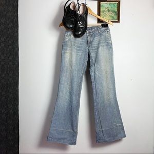Diesel wide leg striped denim trousers.